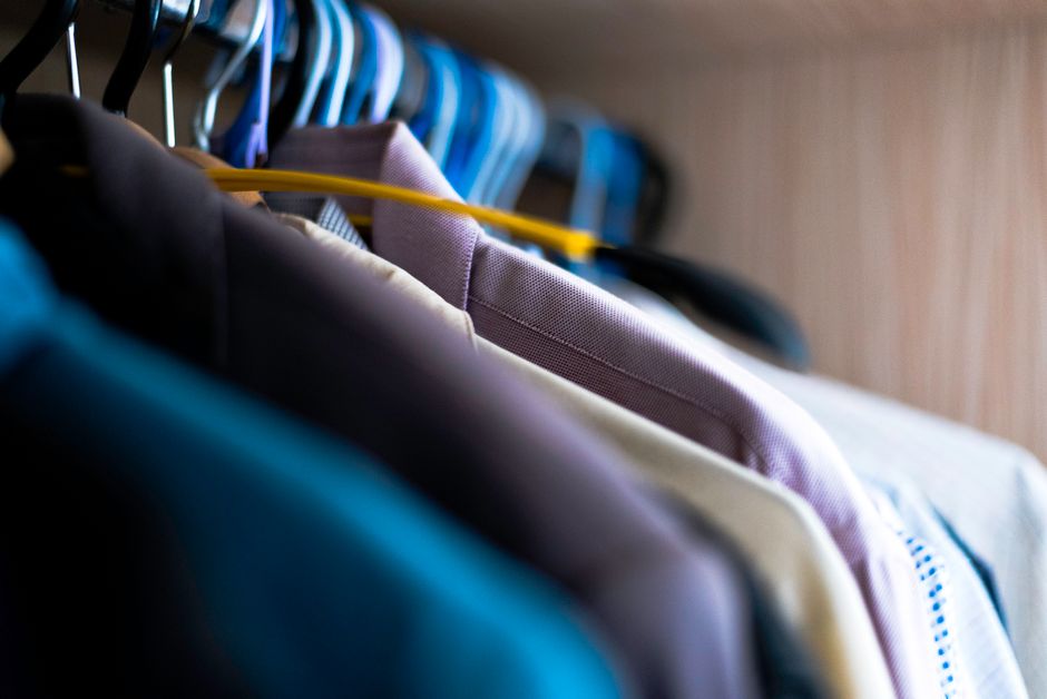 Spacious walk-in closet with custom clothing racks